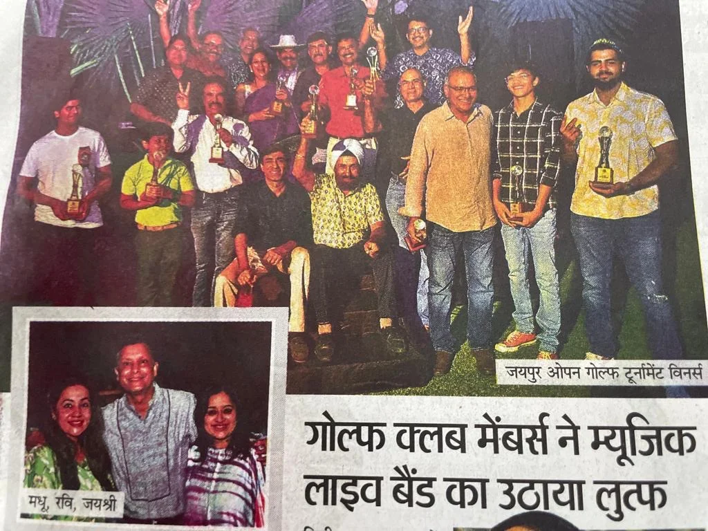 Newspaper photo of the Jaipur Open Golf Tournament winners holding their trophies; Aarav is second from right in a checked shirt